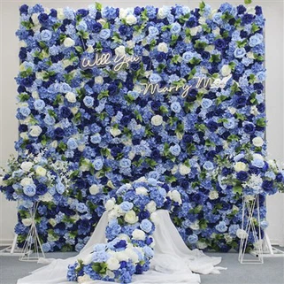 Paret de flors artificials blaves per a fons de festa